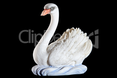 Classic painted marble statuette of swan isolated on black background