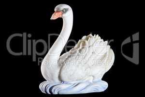 Classic painted marble statuette of swan isolated on black background