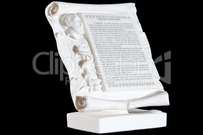 Classical white marble Hippocratic Oath isolated on black background