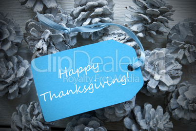 Light Blue Label On Fir Cones With Happy Thanksgiving
