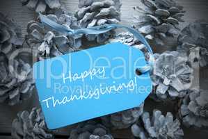 Light Blue Label On Fir Cones With Happy Thanksgiving