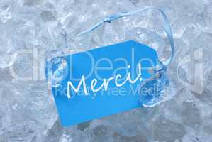 Blue Label On Ice With Merci Means Thank You