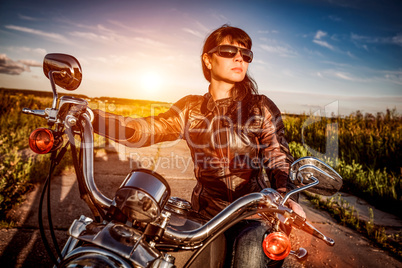 Biker girl on a motorcycle