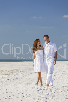 Man Woman Couple Walking on An Empty Beach