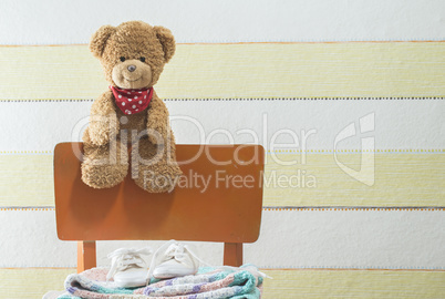 Teddy bear in a baby room