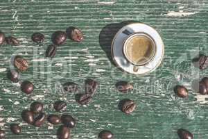 Cup of coffee on wooden table.