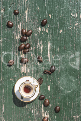 Cup of coffee on wooden table.