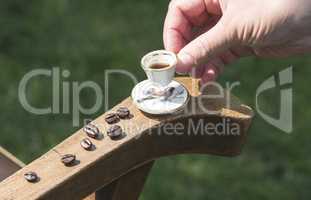 Cup of coffee on wooden table.