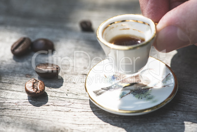 Cup of coffee on wooden table