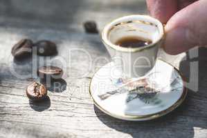 Cup of coffee on wooden table