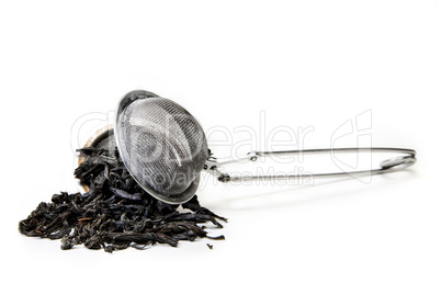 strainer with tea leafs