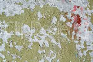 Weathered damaged old painted wall