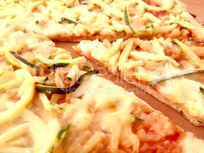 Slice of pizza with potatoes and zucchini