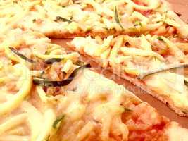 Slice of pizza with potatoes and zucchini
