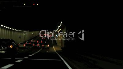 Time lapse of driving though a tunnel at night
