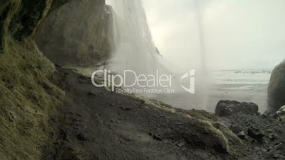 Behind the waterfall Seljalandsfoss in Iceland, wintertime