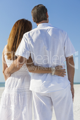 Man and Woman Couple Embracing on Beach