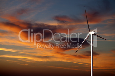 Wind turbine and sunset sky