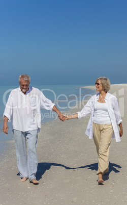 Happy Senior Couple Walking Holding Hands Tropical Beach