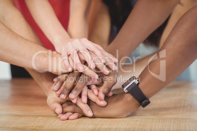 People putting their hands together