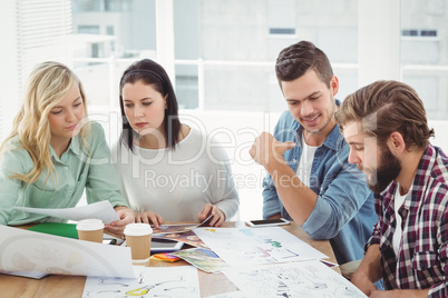 Creative business people working in office