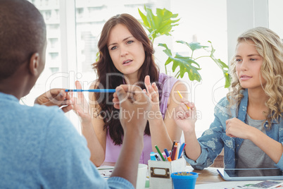 Thoughtful business people working at desk