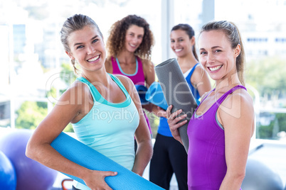 Portrait of attractive women in fitness studio