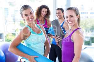 Portrait of attractive women in fitness studio