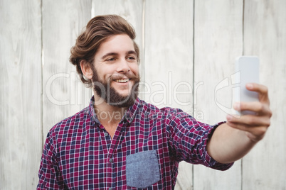 Happy hipster taking selfie Happy hipster taking selfie
