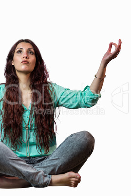 Full length of beautiful woman levitating with arms raised