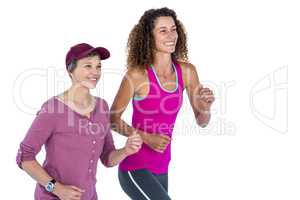 Cheerful female friends jogging