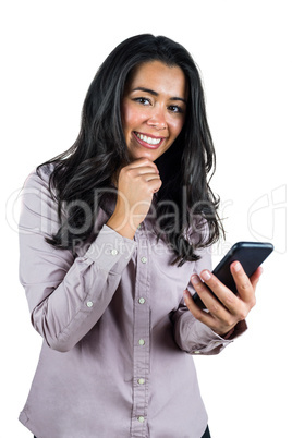 Smiling businesswoman using her smartphone Smiling businesswoman using her smartphone
