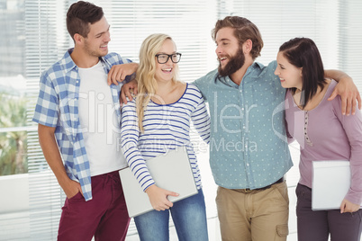 Smiling business people with arm around Smiling business people with arm around