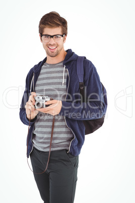 Portrait of happy man with camera