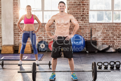 Two fit people working out