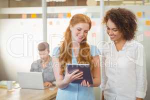 Businesswomen using digital PC