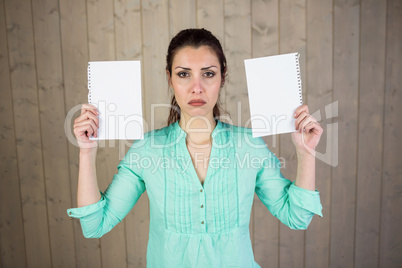 Portrait of woman holding papers