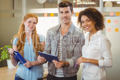 Business people holding document and digital tablet