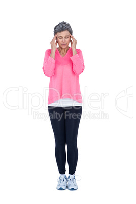 Full length of mature woman suffering from headache