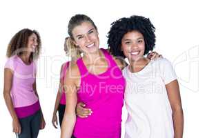 Portrait of cheerful women with arms around