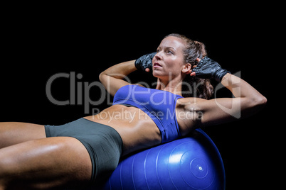 Woman exercising on ball