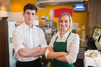 Happy confident coworkers in bakery