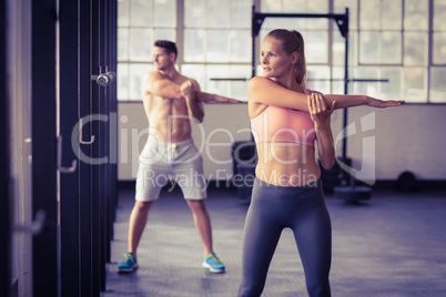 two fit people doing fitness