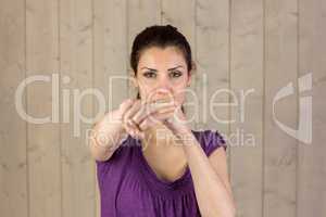 Portrait of woman punching