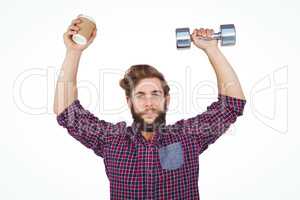 Portrait of hipster holding dumbbells and disposable cup
