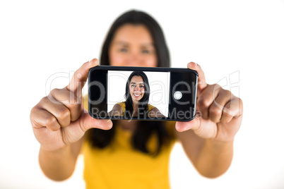 Cute woman taking a selfie