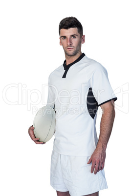 Portrait of a focused rugby player holding ball