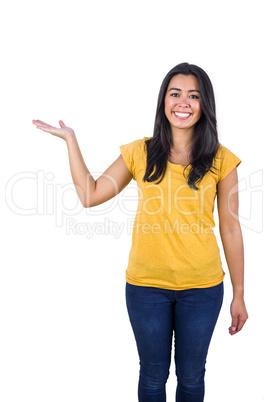 Smiling woman holding her hand up