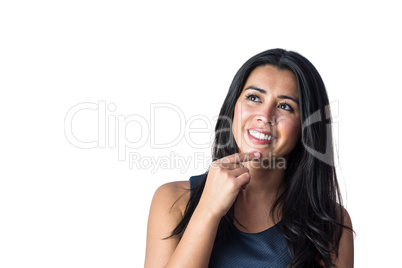 Thinking woman resting her finger on her chin