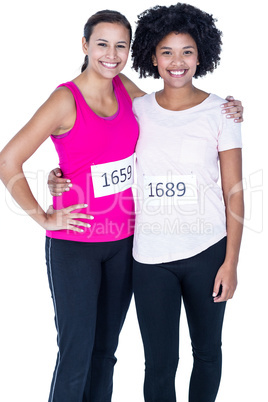 Portrait of happy female athletes